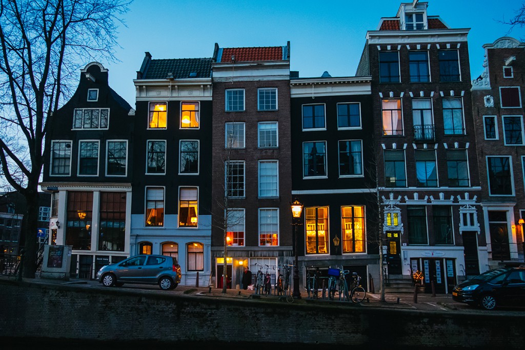 Amsterdam's canal houses after dark