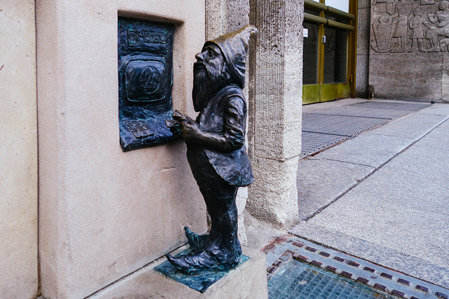 Statue at ATM, Wroclaw