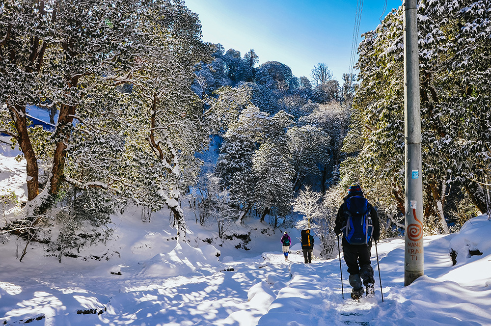 Trekking through snow in Nepal