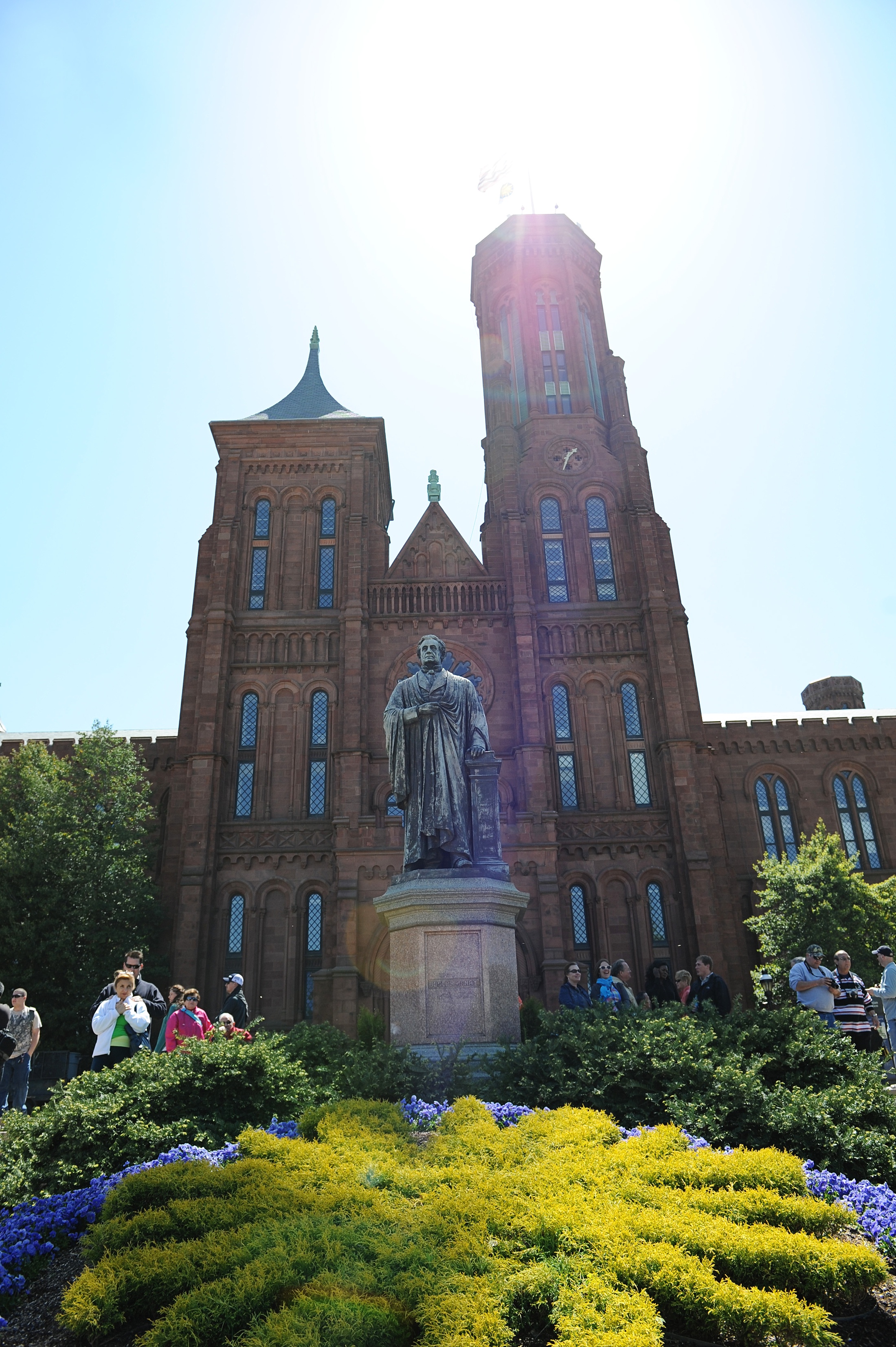 How to Spend One Perfect Day in Washington, DC with a photo of the Smithsonian Castle on the National Mall.