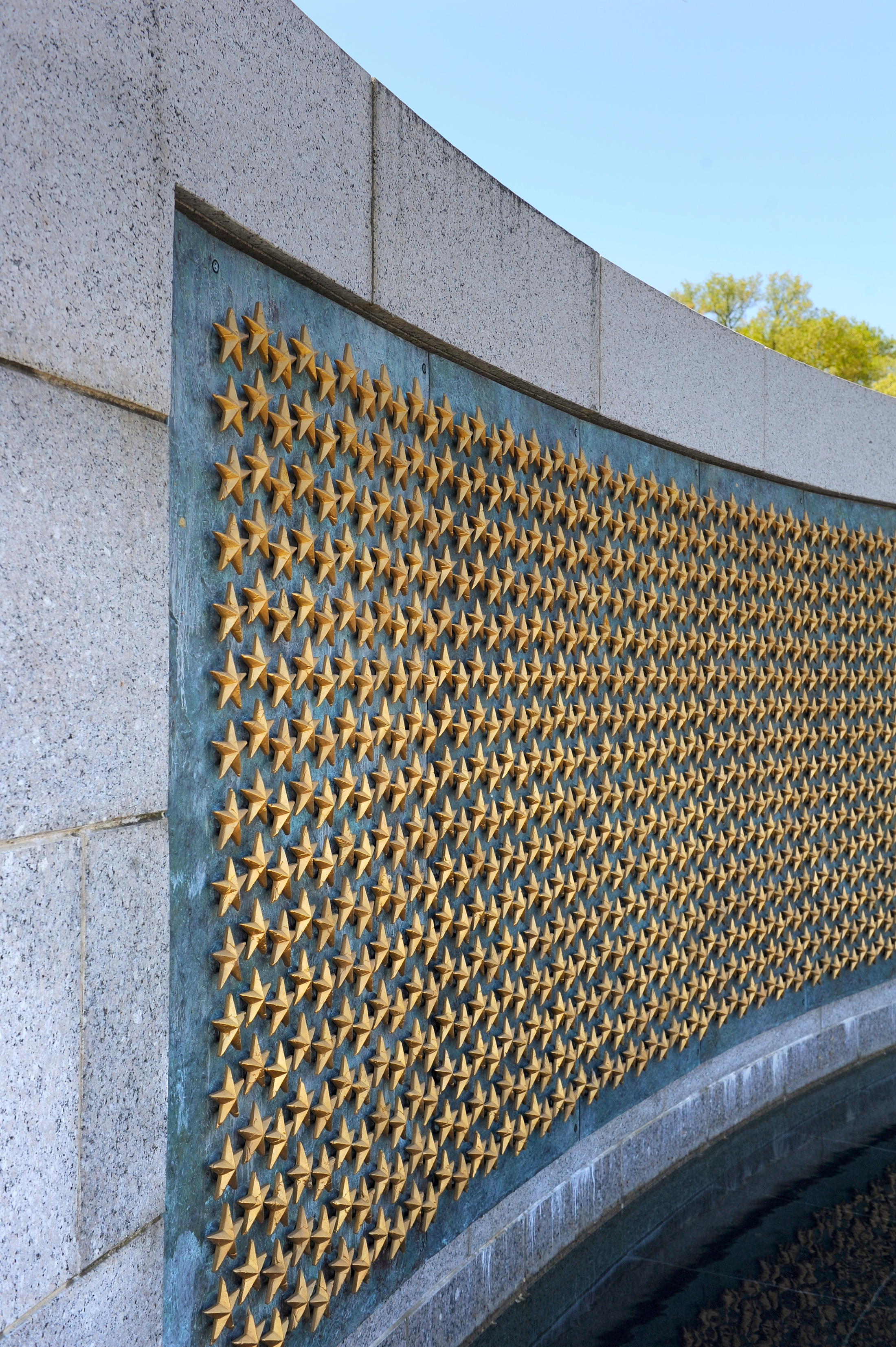 How to Spend One Perfect Day in Washington, DC with a photo of the World War II Memorial gold stars.